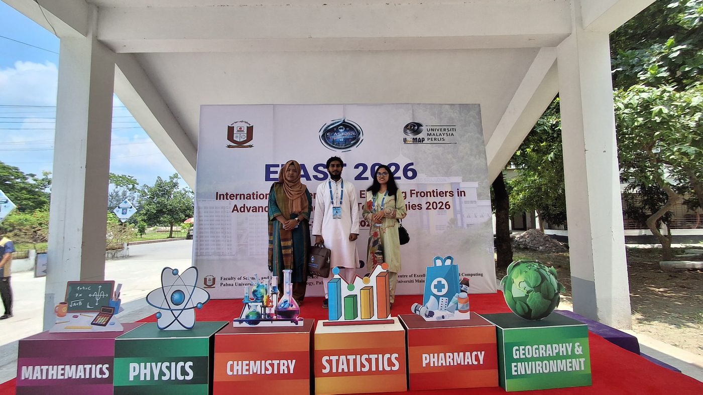 Standing in front of the EFAST 2026 backdrop at Pabna University of Science and Technology